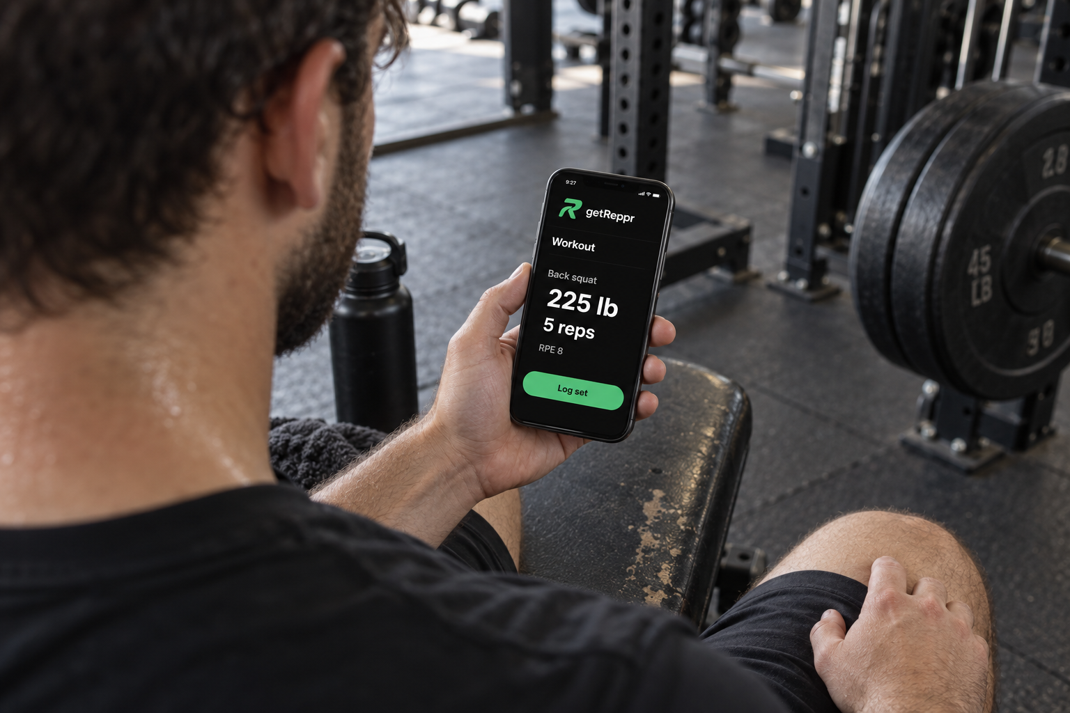 Illustration of a gym-goer checking a Reppr workout on their phone between sets